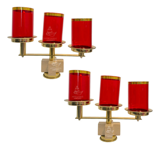 Par de candeleros de tres luces modelo cruces, ónix y latón, pantallas rojas, hechos a mano en México